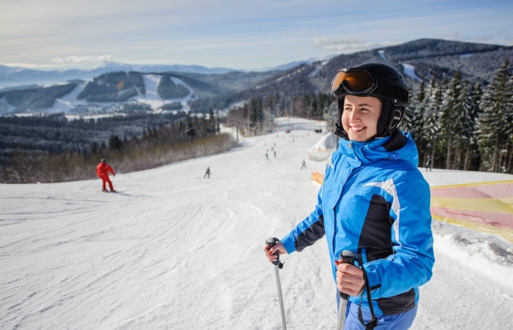 A woman on skis in Vail's Back Bowl on a snowy slope